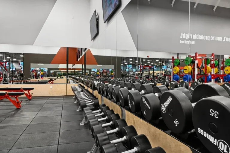 Dumbbell racks in the premium free weight room at 10 Fitness Bowman