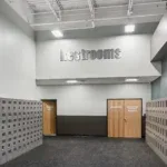 Locker rooms and restroom entrance at 10 Fitness Bowman