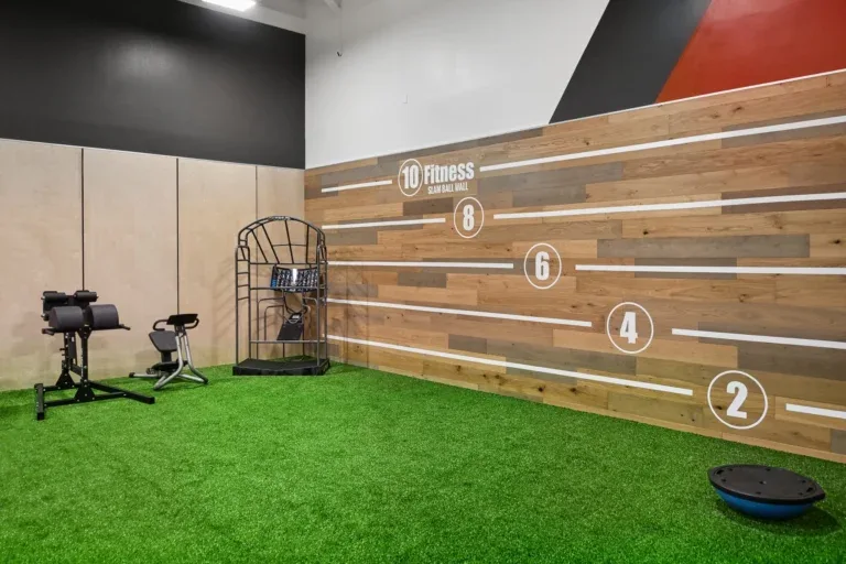 Turf functional training area with sled lanes at 10 Fitness Bowman